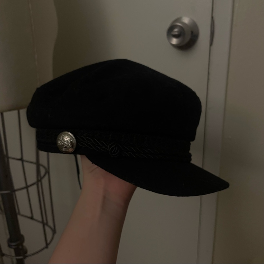 Black newsboy cap with silver button